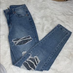 Ripped fishnet jeans